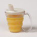 The Ergo Mug also comes in a clear-colored model and is shown here with the optional lid. 